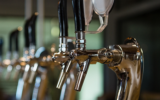 beer taps at a bar