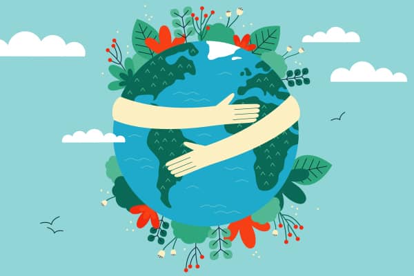 Arms hugging a globe